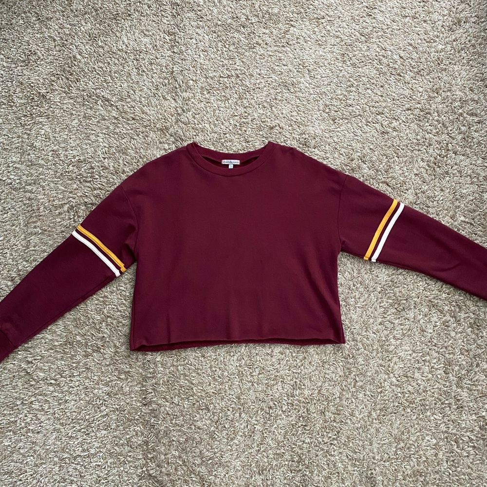 Charlotte Russe sweater, size S. Maroon with yellow&white stripes on sleeve